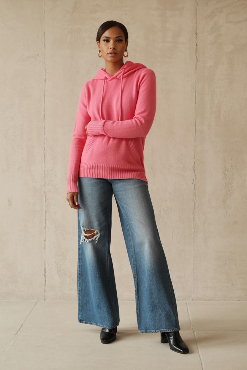Team a bright cashmere hoodie with distressed⁤ denim and heeled ‌booties