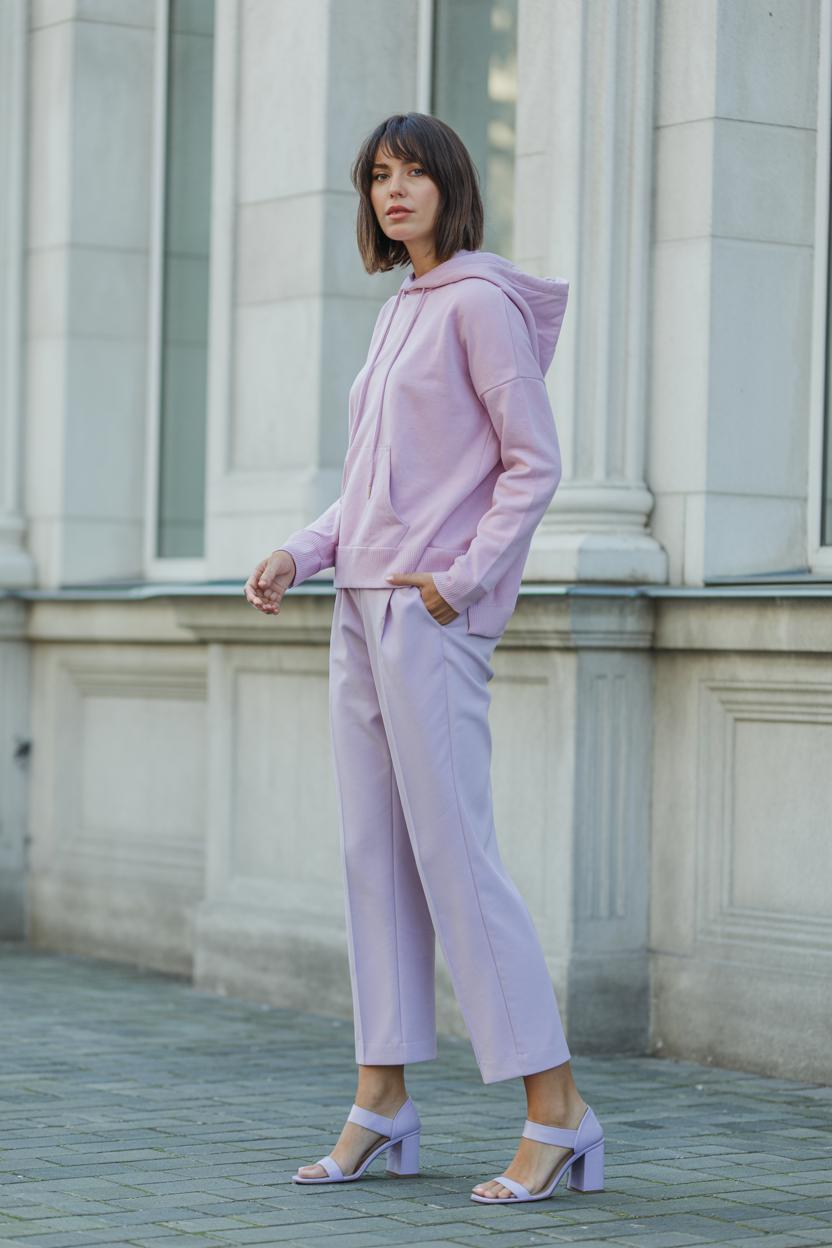 Style a pastel cashmere hoodie with⁢ cropped trousers and block heels
