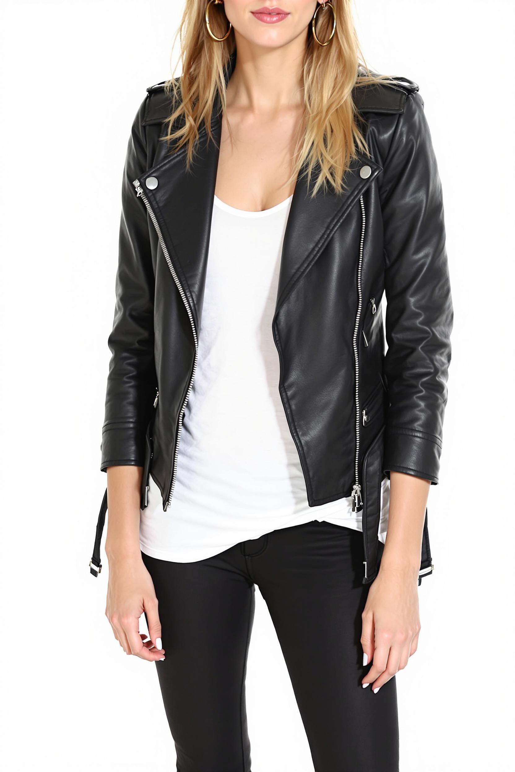 Sleek black vegan ⁤leather jacket​ paired with a ⁤white tank and skinny pants