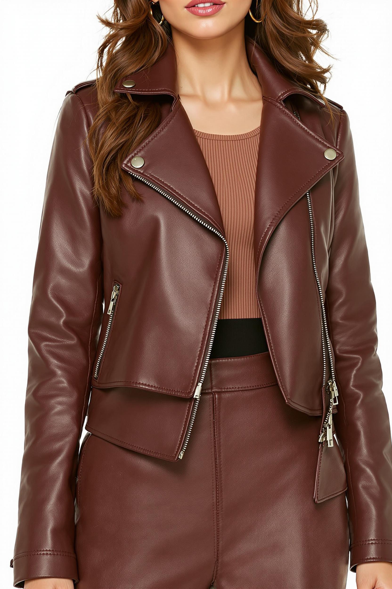 Matte vegan leather biker​ jacket teamed ‍with a ribbed tank and high-waisted pants